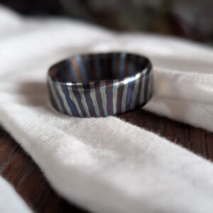 Zirconium and titanium (zircuti) ring, polished