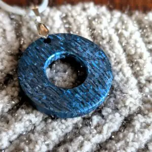 Crystal blue titanium damascus pendant
