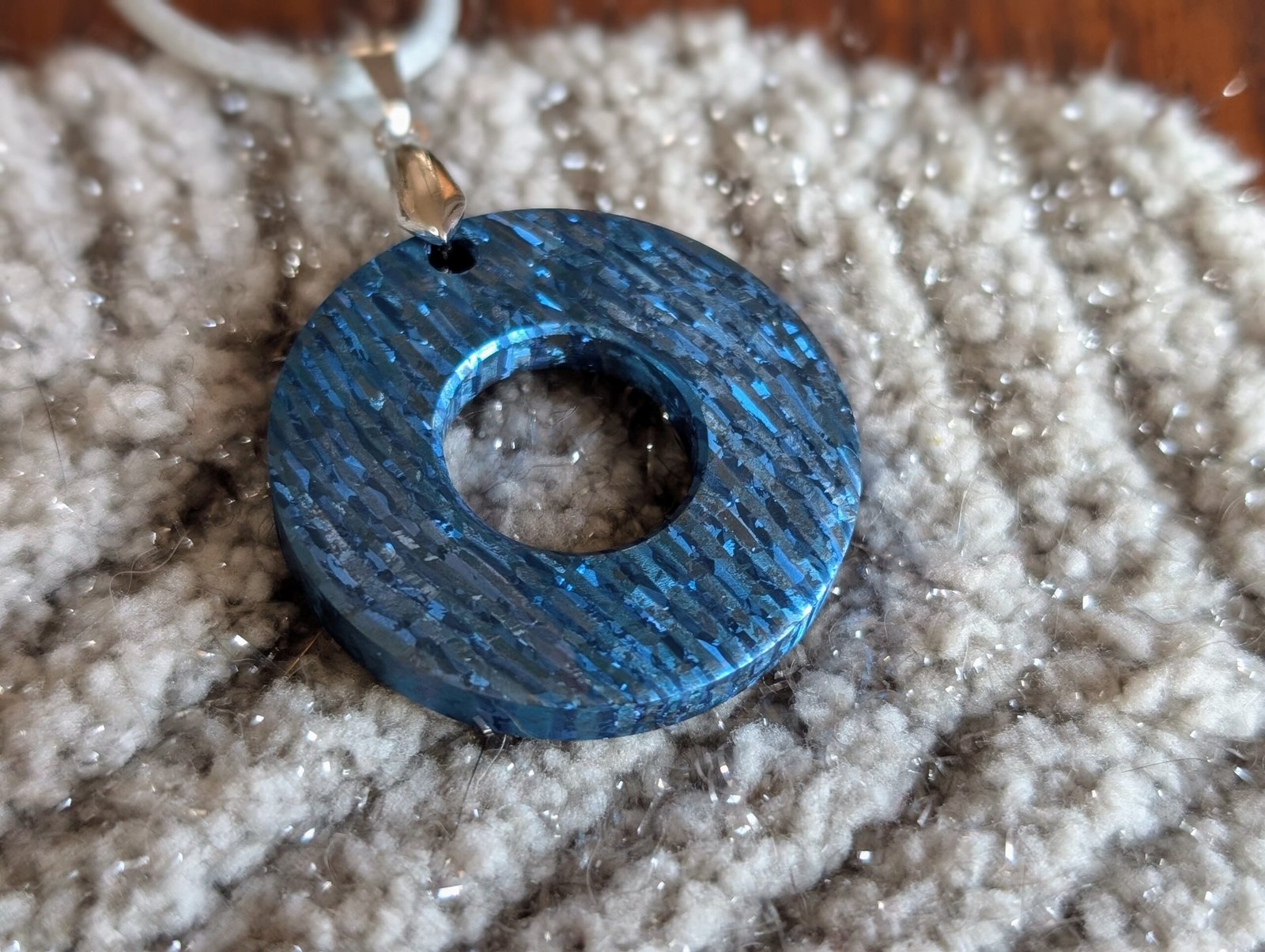 Crystallised titanium damascus pendant