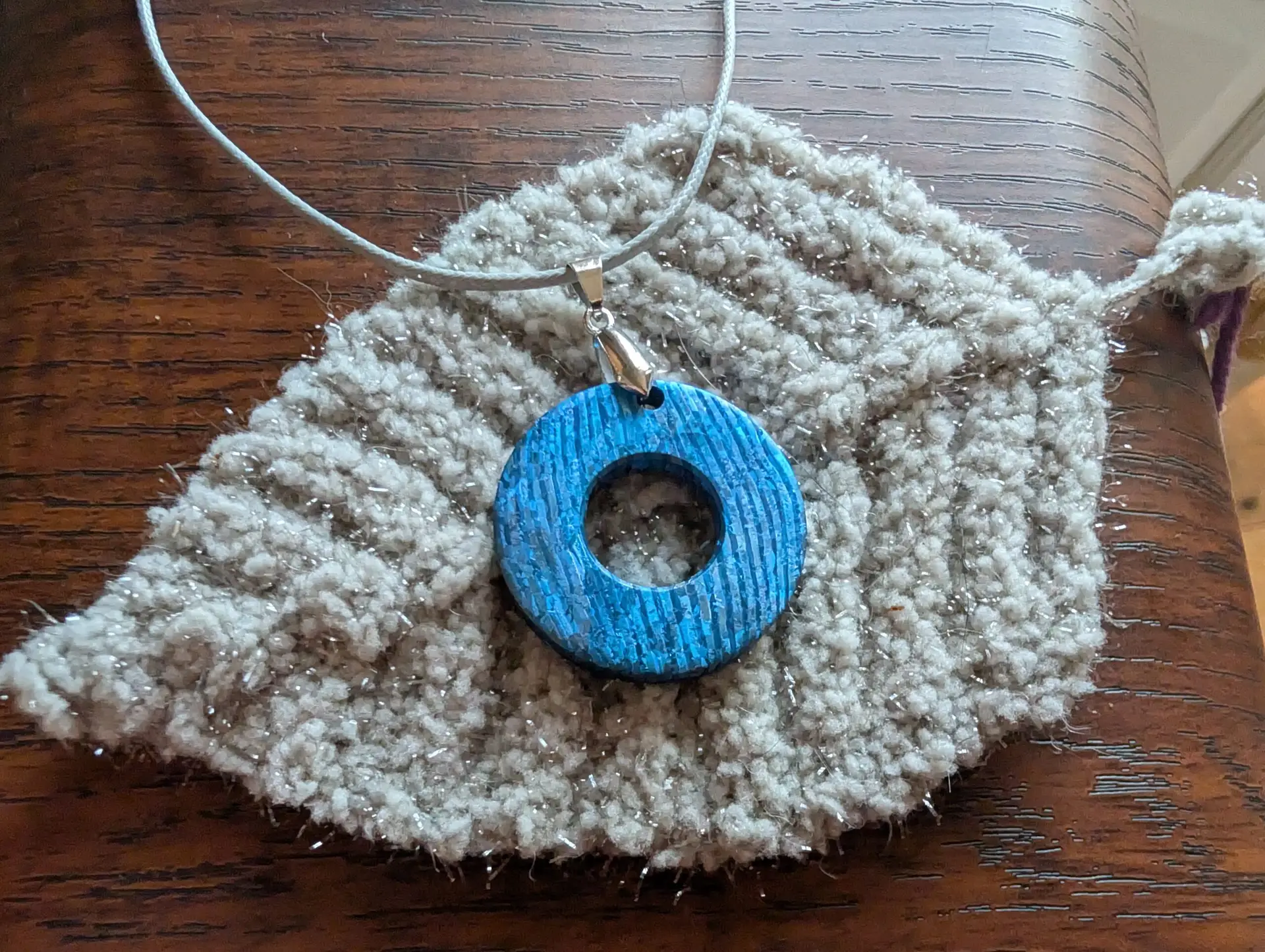 crystal blue titanium damascus pandant